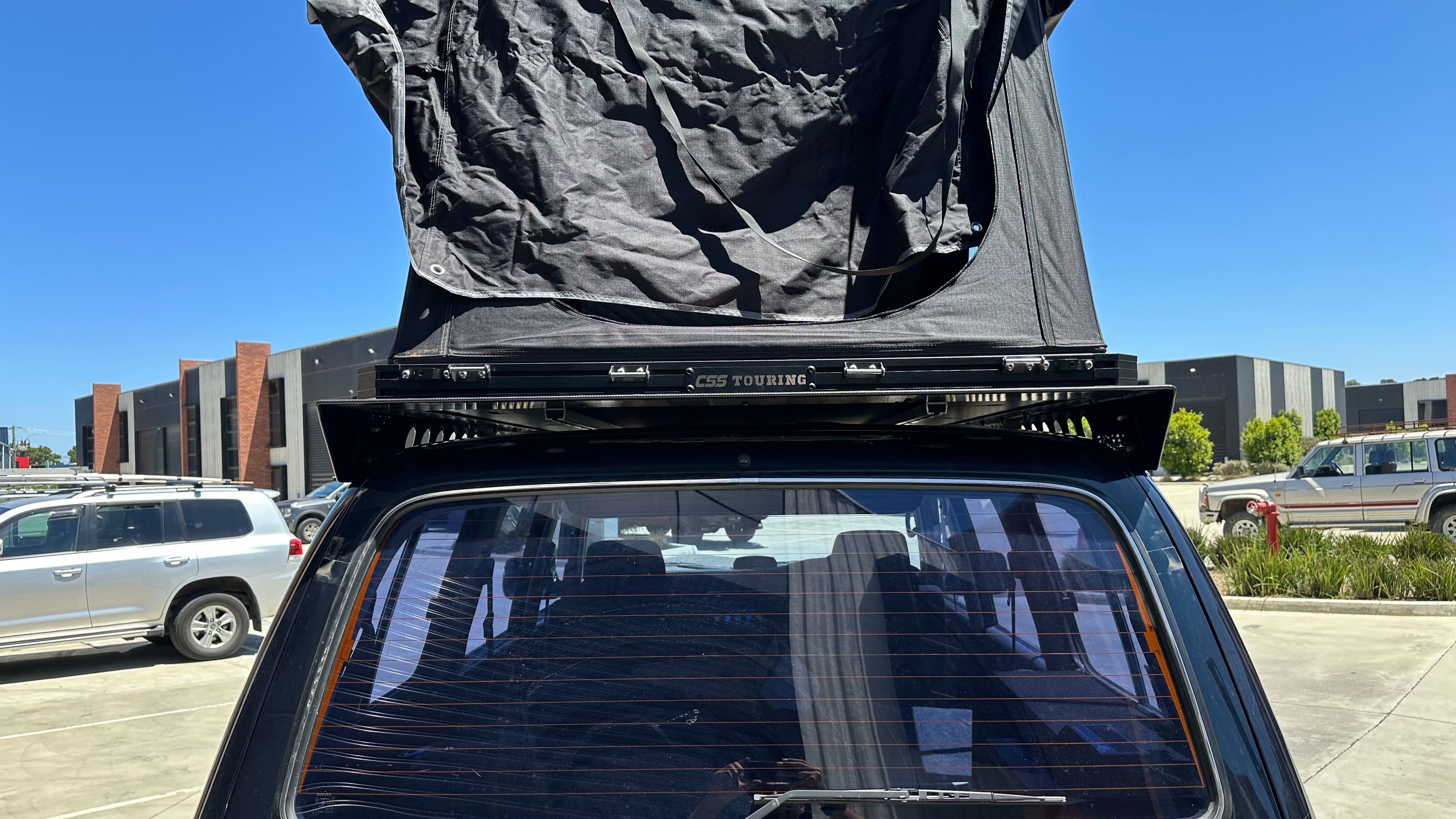 Tier One Metalworks Toyota Landcruiser 80 Series slimline roof racks rear view. Wedgetail rack, rhinorack, Pirate Camp Co