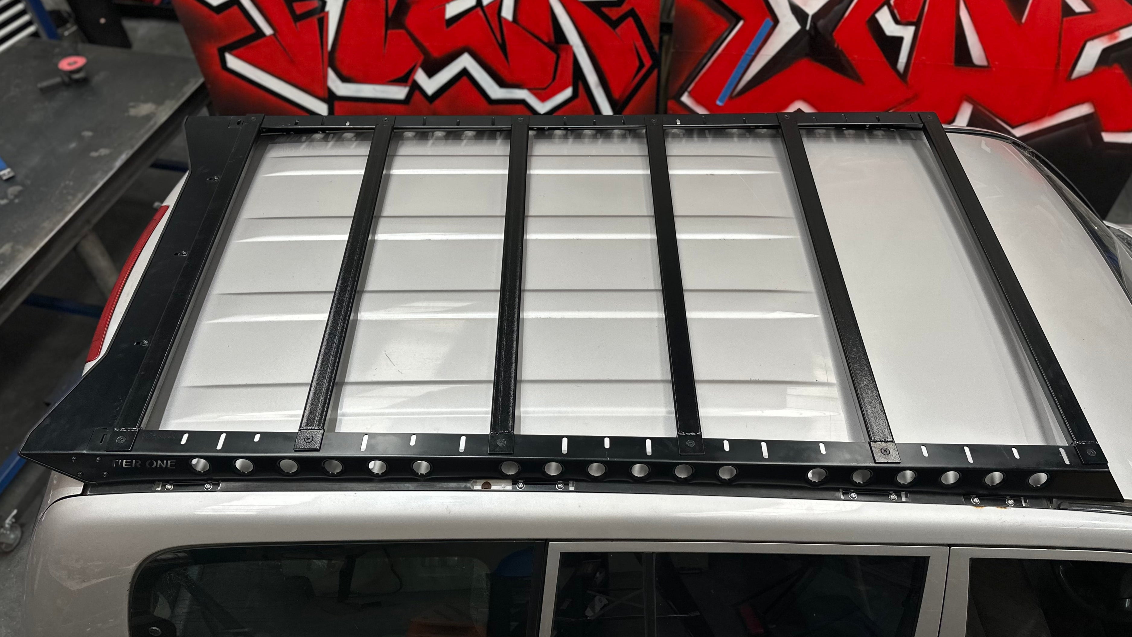 Photo of Toyota Landcruiser 100 105 series slimline roof rack Tier One metalworks